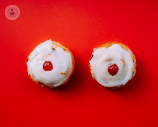 Two cupcakes on a red background