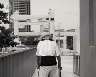 An old man suffering from bowel cancer 