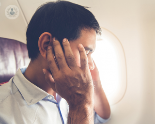 A man suffering from hearing loss