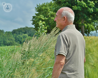 An old man in a field 