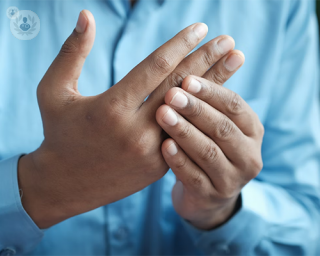 Carpal tunnel syndrome causes pain in the hand and fingers. 