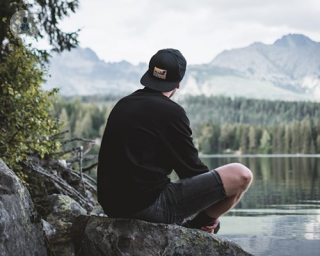 Man looking at the view while being concerned about testosterone deficiency