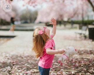 Child playing who has benefited from the intergration of holistic and conventional approaches in paediatric care