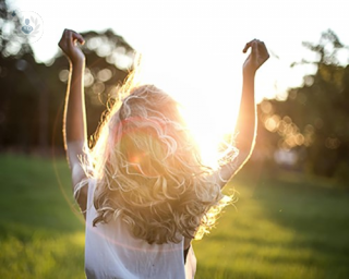 woman looking at the sun and thinking about abnormal smear test and  HPV