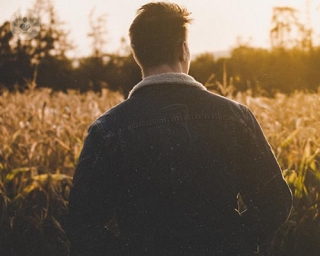 Man suffering from anxiety staring into the scenery