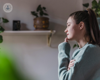 Woman with postpartum mental health issues