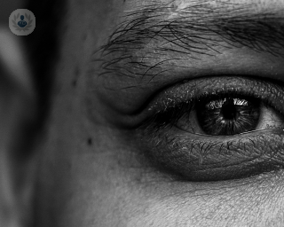 Black and white photo of a man's eye