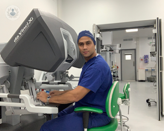 Mr Jonathan Noël handling a Da Vinci robotic surgical system that enables him to perform robotic radical prostatectomy procedures.
