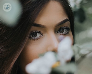 Woman thinking about having facial volumisation treatment