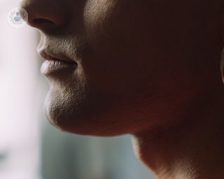 A young woman's left side profile