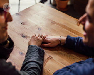 Couple discussing the impact of ADHD on their relationship.