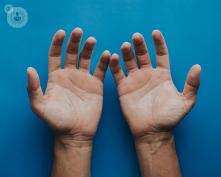 hands with blue background