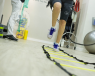 A patient practising physical therapy exercises, as part of their neurological rehabilitation program.