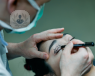 A picture of a woman being prepared for blepharoplasty