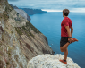 stretching leg on a rock