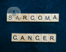 Letter blocks spelling out the words 'sarcoma cancer'