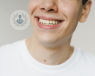 Young man who has had periodontal plastic surgery for receeding gums.