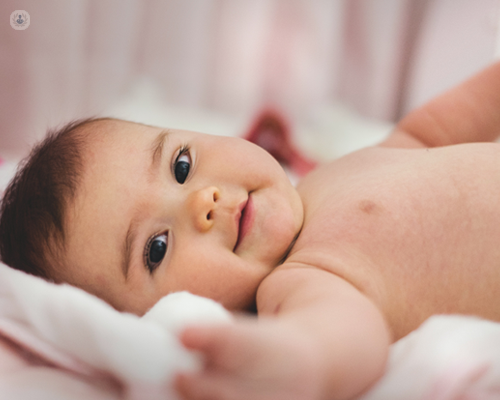 Baby under one-year-old, who has recovered from a cough.