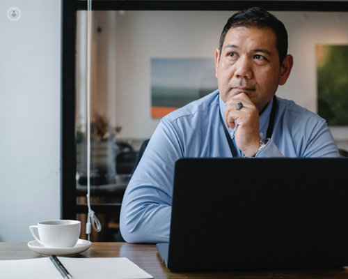 Man thinking about different drugs available to treat colon cancer.