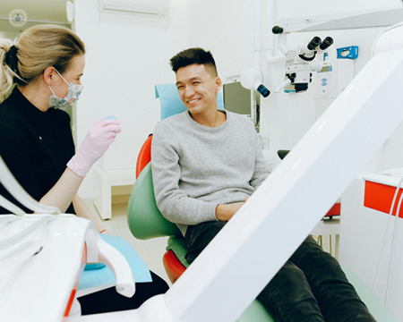 Man who experiences dental pain preparing for root canal treatment